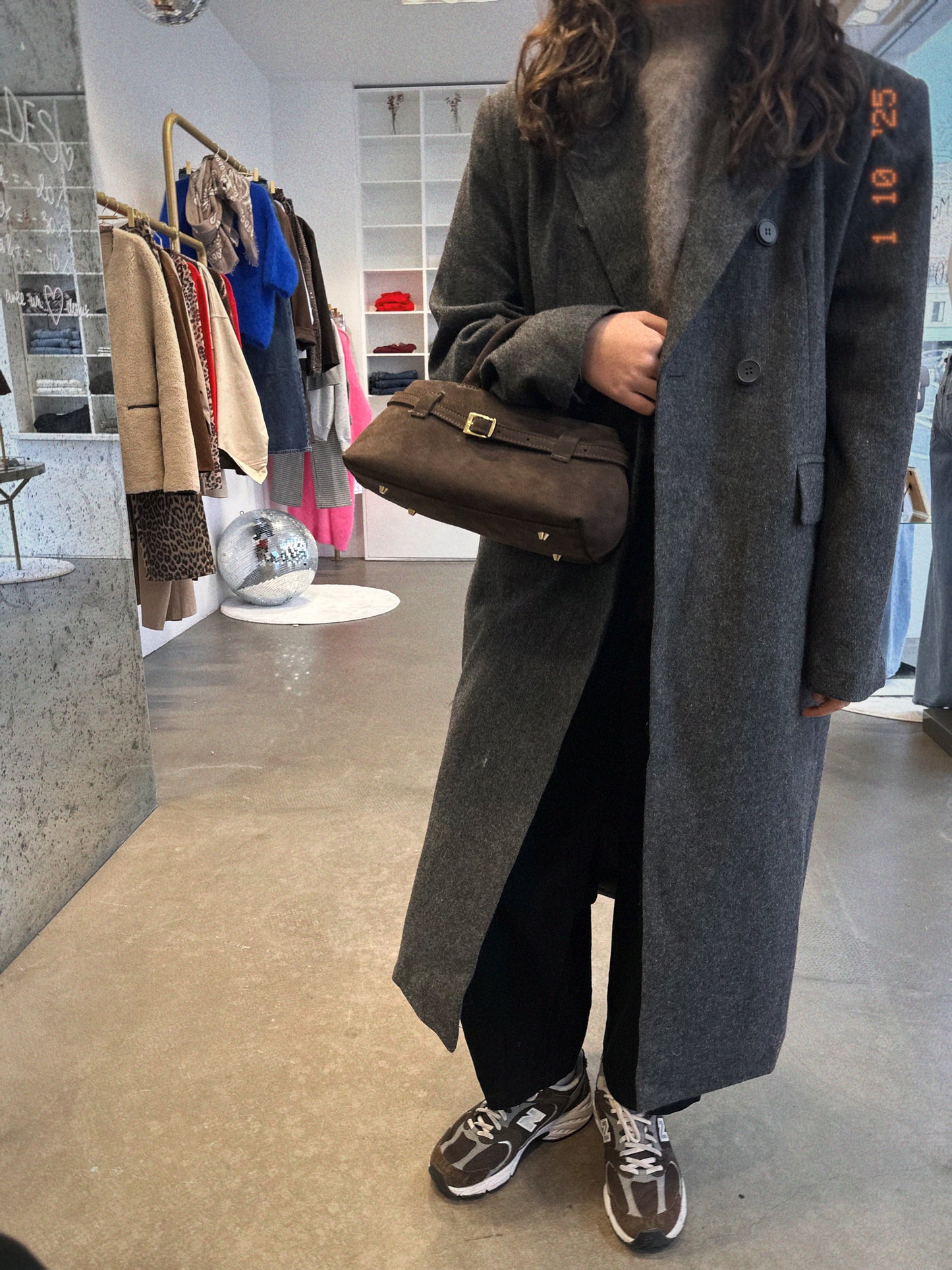 May, le manteau long